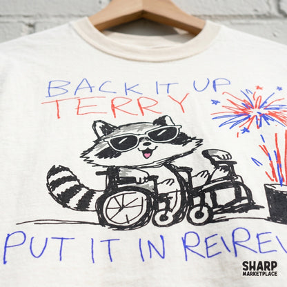 Funny raccoon in a wheelchair with red and blue fireworks and star accents, featuring the text Back It Up Terry Put It In Reverse for sublimation.