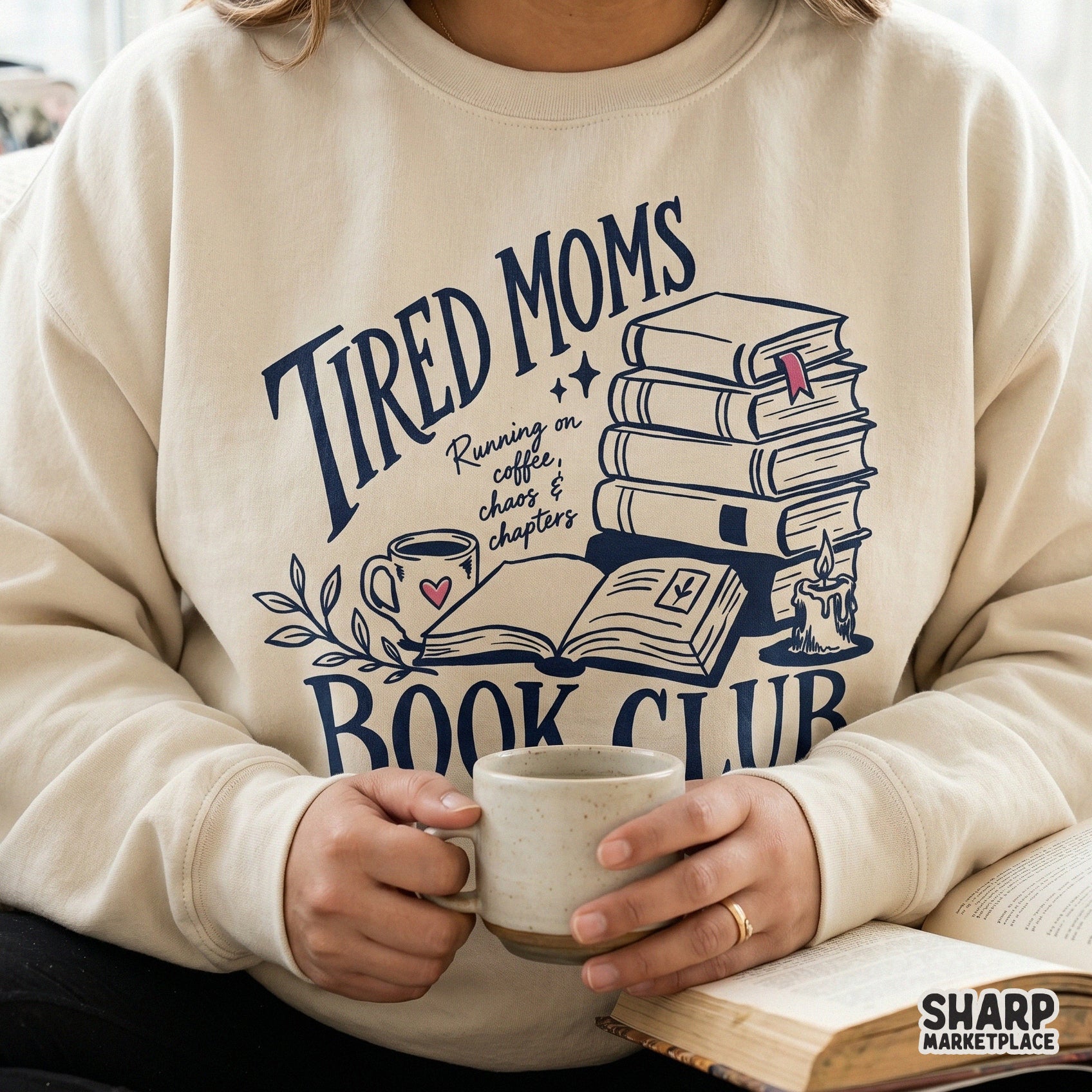 Detailed line art illustration of books, a coffee cup, and a candle with the text Tired Moms Book Club, suitable for high-quality print-on-demand projects.