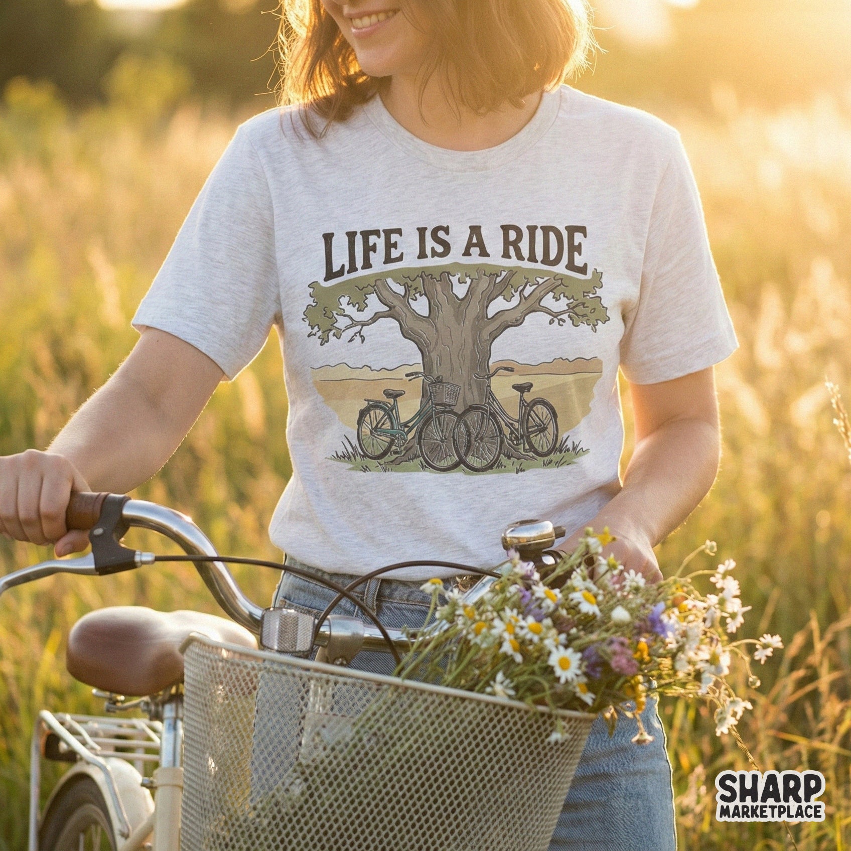 Digital sublimation design with a scenic country landscape, two bicycles, and a large tree, featuring earthy tones and retro typography for DIY projects.