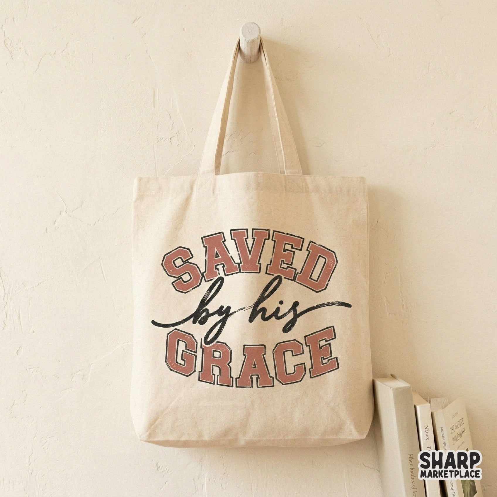 Inspirational religious quote design with a vintage athletic style, featuring bold terracotta block text and flowing script for Christian apparel projects.