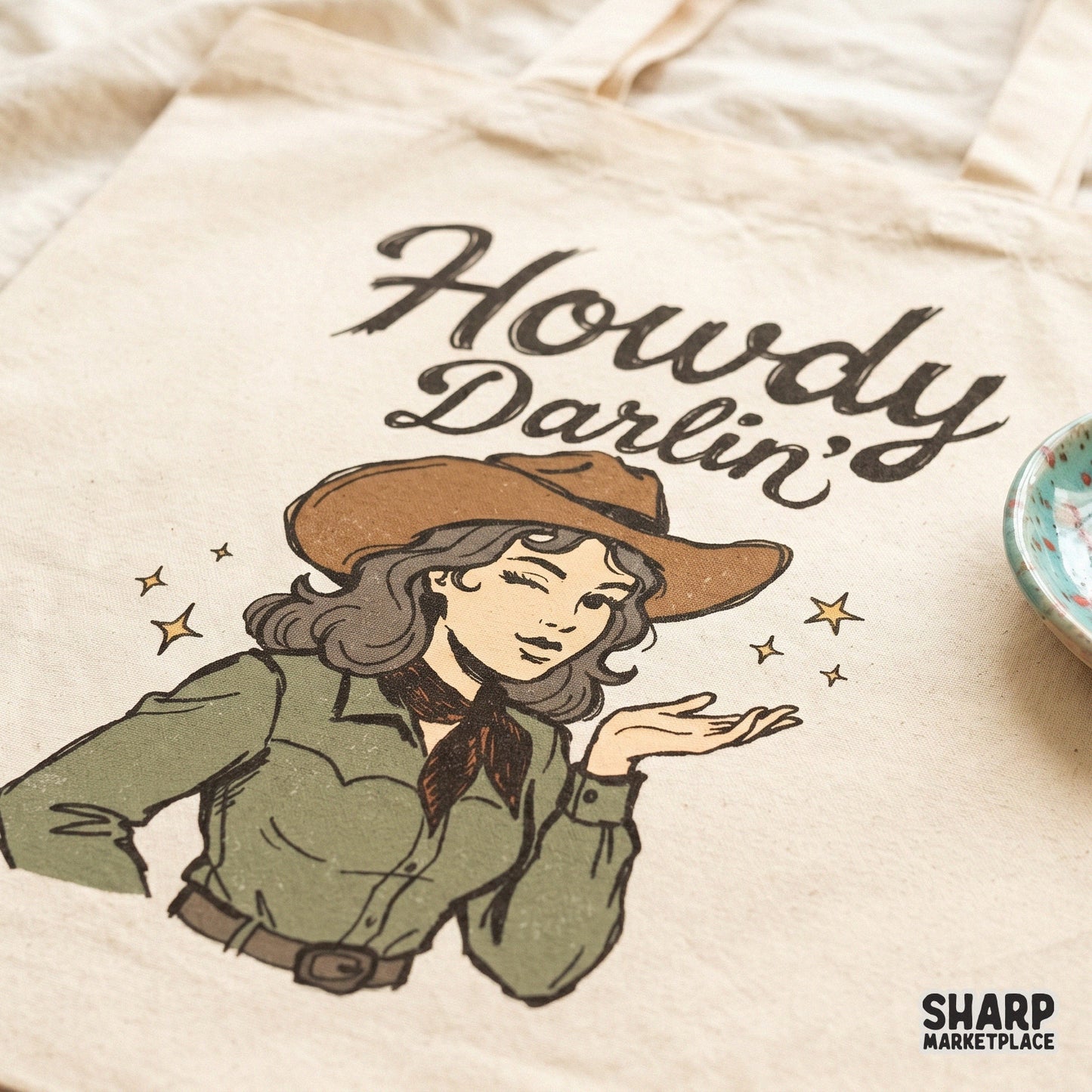 Vintage style cowgirl illustration with a playful wink and blowing kiss surrounded by yellow stars perfect for custom country apparel and stickers.