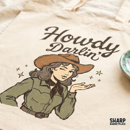 Vintage style cowgirl illustration with a playful wink and blowing kiss surrounded by yellow stars perfect for custom country apparel and stickers.
