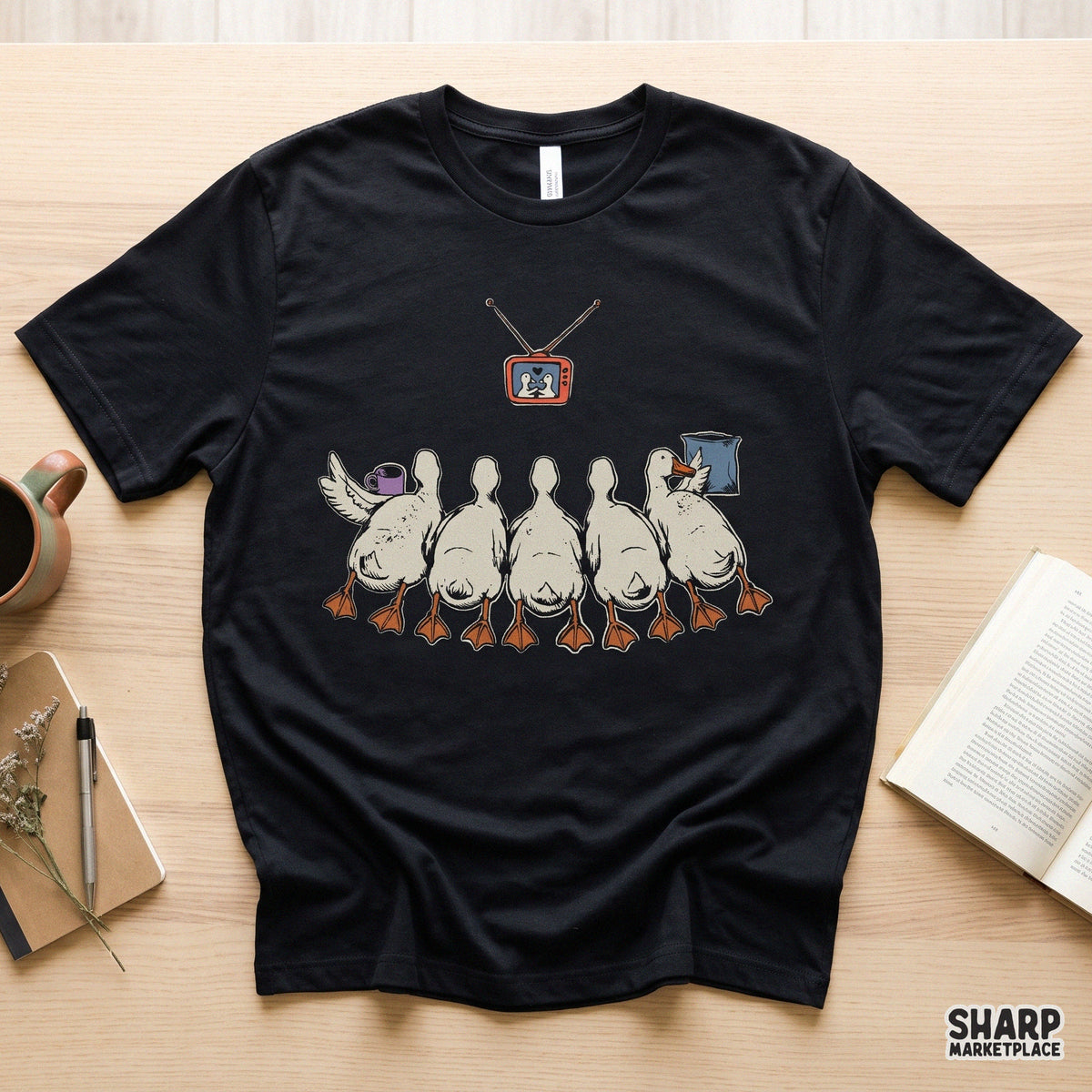 Cute ducks watching retro TV for a cozy movie night PNG graphic for shirt and apparel designs