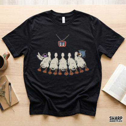 Cute ducks watching retro TV for a cozy movie night PNG graphic for shirt and apparel designs