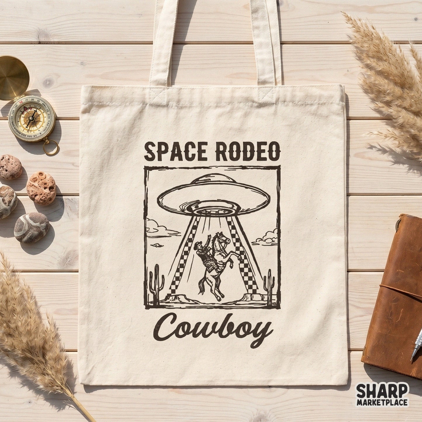 Hand-drawn desert-themed PNG graphic with a UFO, bucking horse, and western typography, perfect for custom t-shirts, stickers, and rustic wall art.