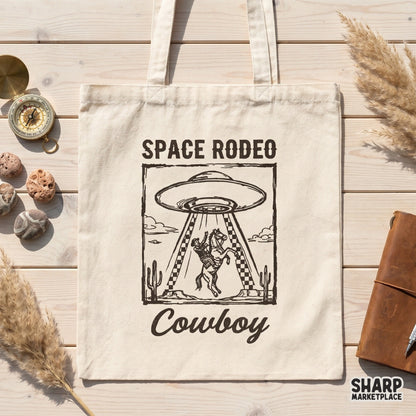 Hand-drawn desert-themed PNG graphic with a UFO, bucking horse, and western typography, perfect for custom t-shirts, stickers, and rustic wall art.