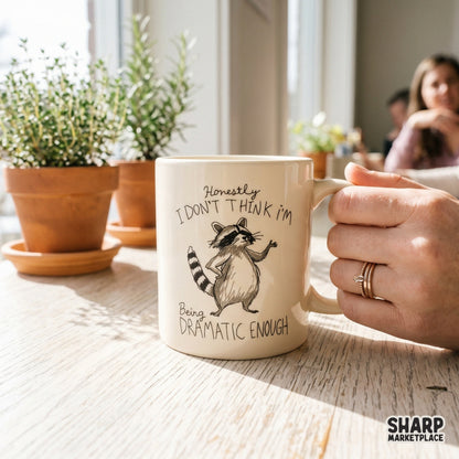Quirky raccoon artwork with a dramatic flair and handwritten text, suitable for DTF printing, sublimation transfers, and unique personalized gifts.