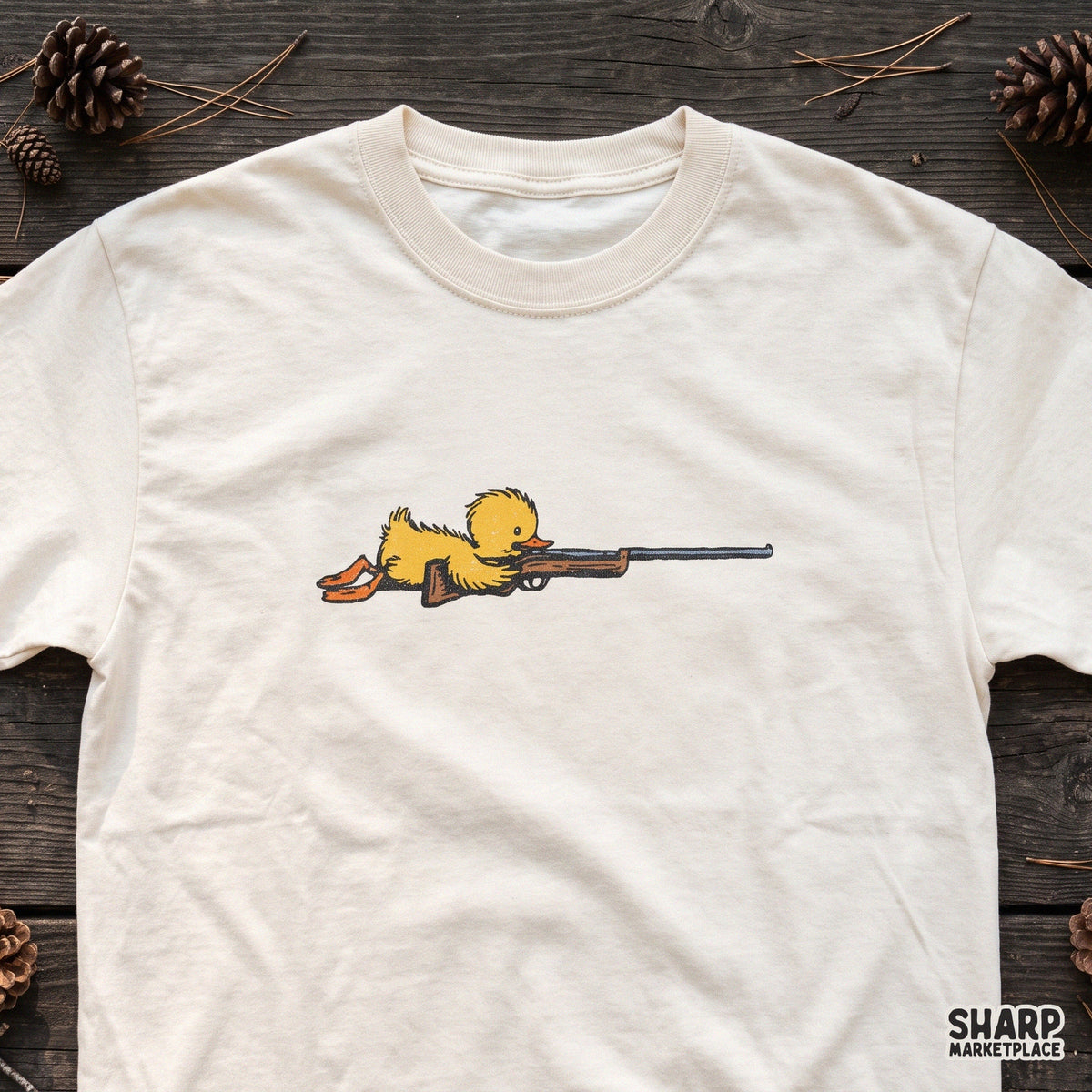 Sniper duckling aiming a rifle in prone position funny hunting PNG clipart design for shirts and outdoor apparel