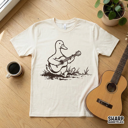 Monochromatic hand-drawn duck strumming a guitar, featured as a digital design on a light-colored t-shirt for custom clothing projects.