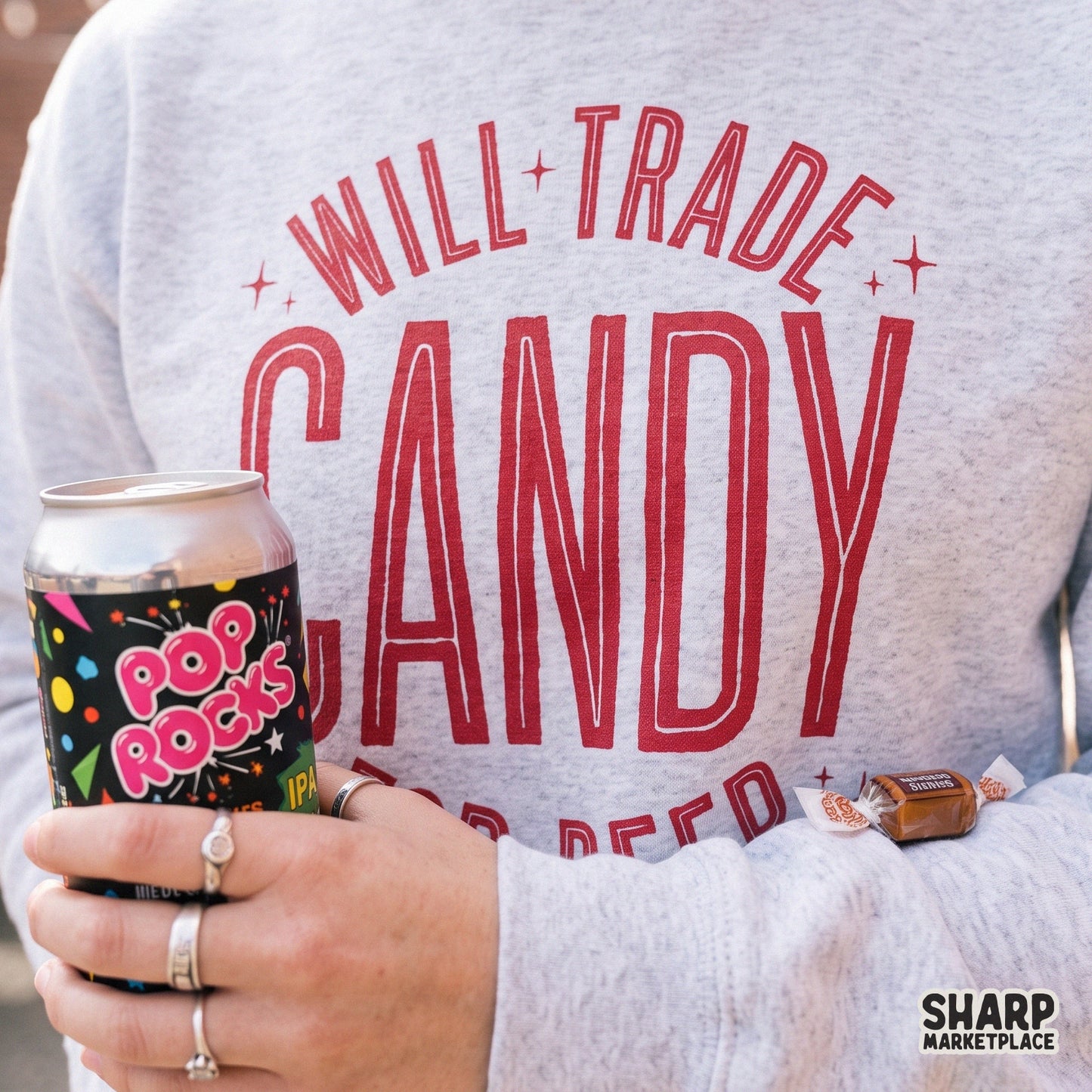 Retro sublimation design featuring Will Trade Candy For Beer text for funny Halloween shirts and drinking humor gifts