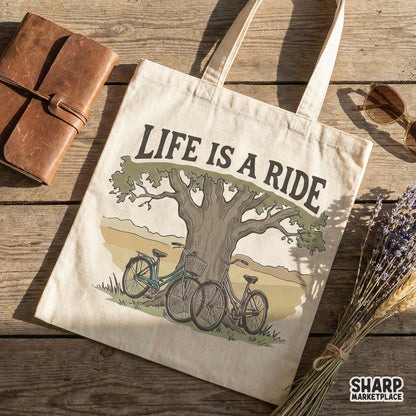 Tote bag mockup displaying a retro nature graphic of two bikes under a tree with the quote Life Is A Ride, perfect for custom apparel and sublimation.