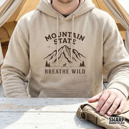 Outdoor-inspired mountain state graphic with pine trees and a deer, designed for high-quality printing on tumblers, shirts, and home decor.