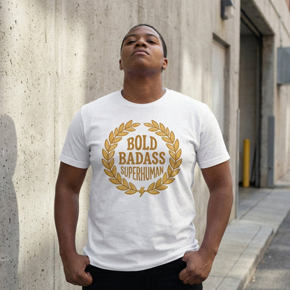 Motivational quote sublimation design on a white t-shirt featuring golden laurel leaves and distressed block lettering for empowering apparel.