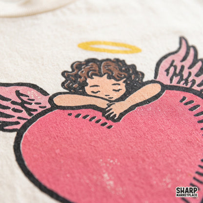 Vintage cherub angel hugging a red heart in cute retro cupid aesthetic for Valentine shirt sublimation PNG