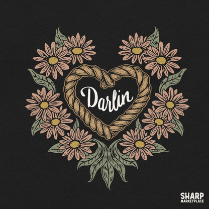 Retro Western darlin graphic featuring a rope heart framed with pink daisies for cowgirl apparel PNG design