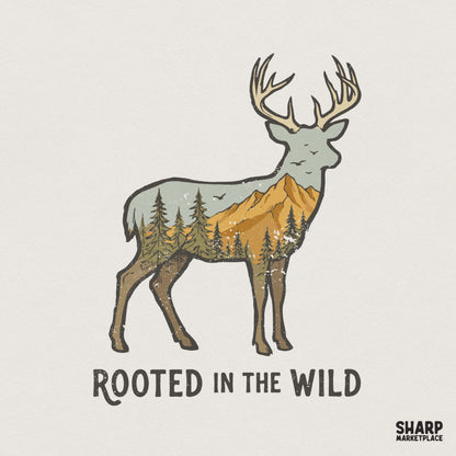 Double exposure deer silhouette featuring a golden mountain and evergreen forest landscape with the text Rooted in the Wild for nature-themed apparel.
