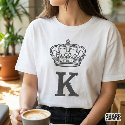 Detailed royal letter K clipart with a majestic crown and fleur-de-lis accents, ideal for creating custom family crests, stickers, or elegant wall art.