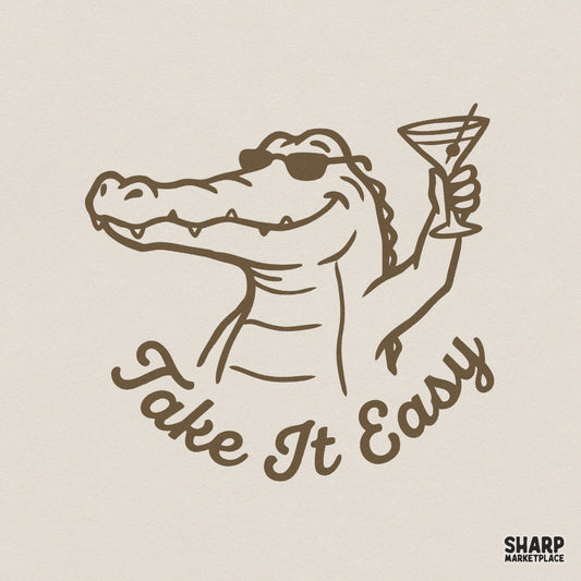 Retro monochromatic brown line art of a smiling alligator wearing sunglasses and holding a martini glass with the text Take It Easy underneath.