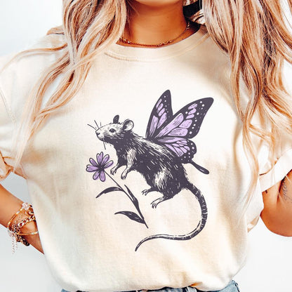 Vintage style fairy rat design featuring detailed butterfly wings and a purple flower, shown printed on a light-colored t-shirt.