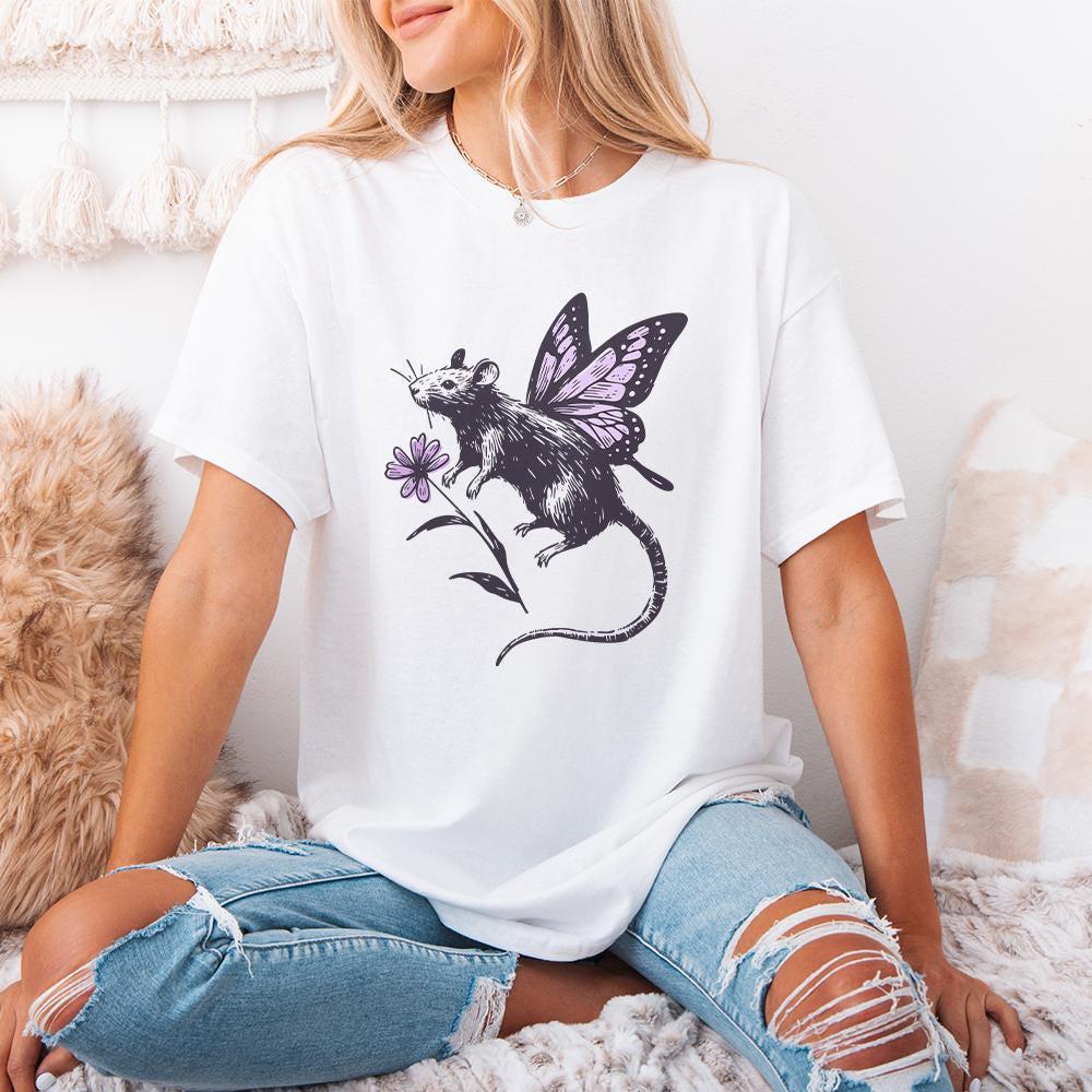 Cute winged rat clipart with purple butterfly wings and a floral accent, perfect for fairy core themed sublimation and craft projects.