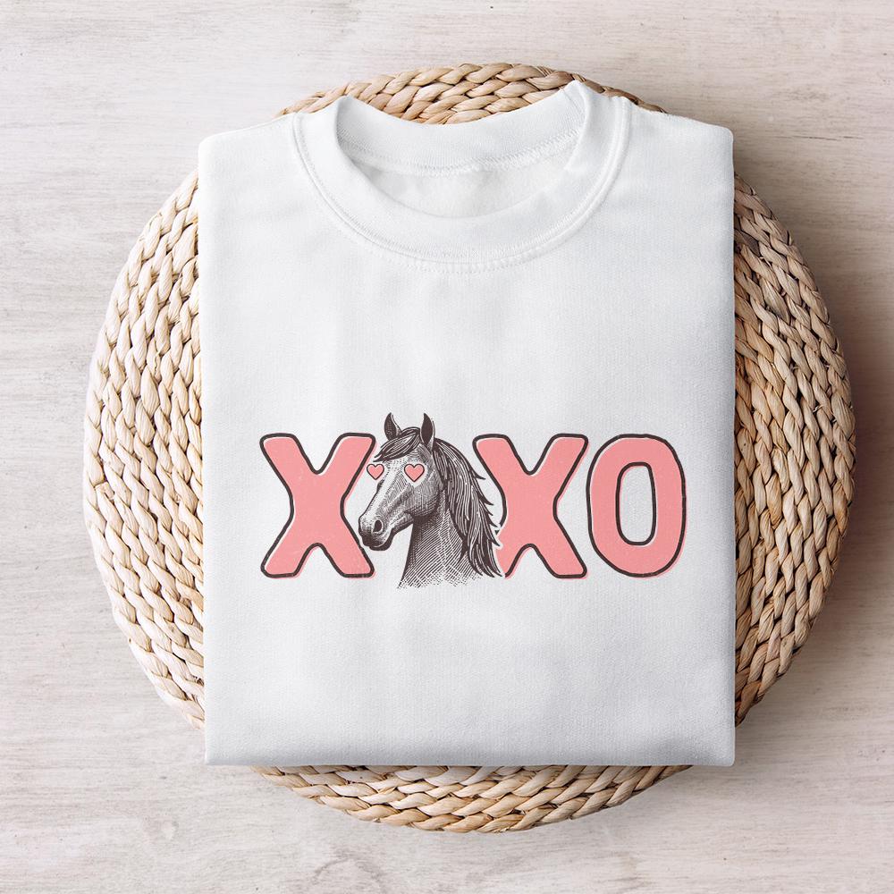 Romantic horse graphic with heart eyes and pink XOXO typography, suitable for custom tote bags and tumblers.