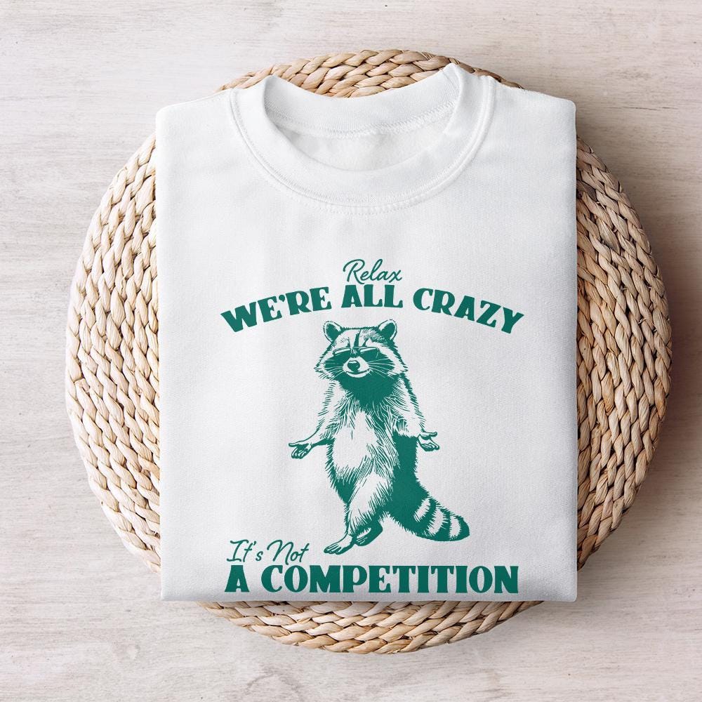 Relax We're All Crazy It's Not A Competition PNG, Funny Raccoon Design -
