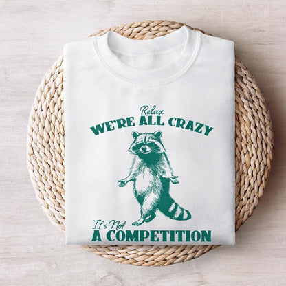 Relax We're All Crazy It's Not A Competition PNG, Funny Raccoon Design -