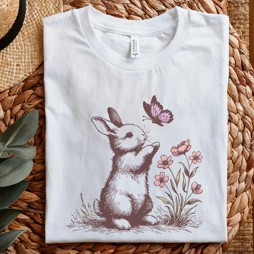 Whimsical floral bunny design with a butterfly, high-quality digital graphic for print-on-demand apparel and wall art projects.