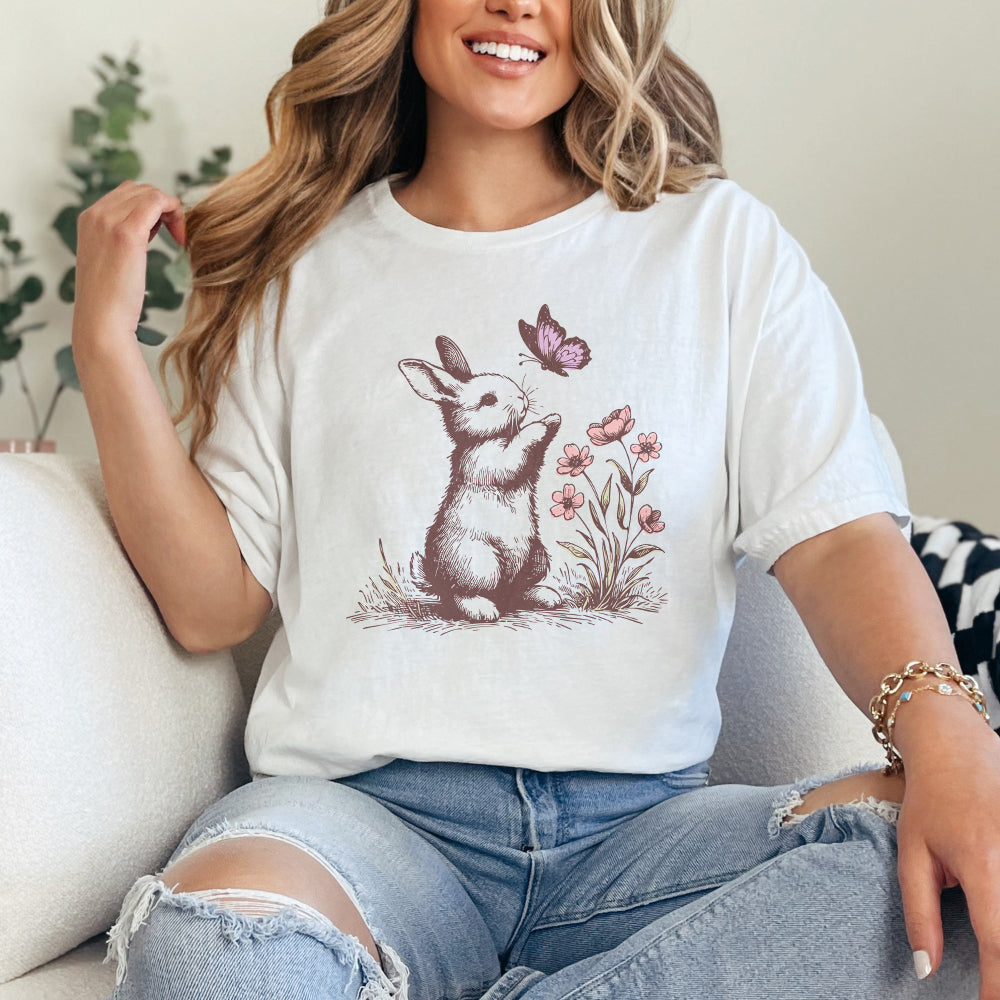Charming rabbit silhouette with butterfly and flowers, a versatile digital file for laser cutting, scrapbooking, and custom craft gifts.